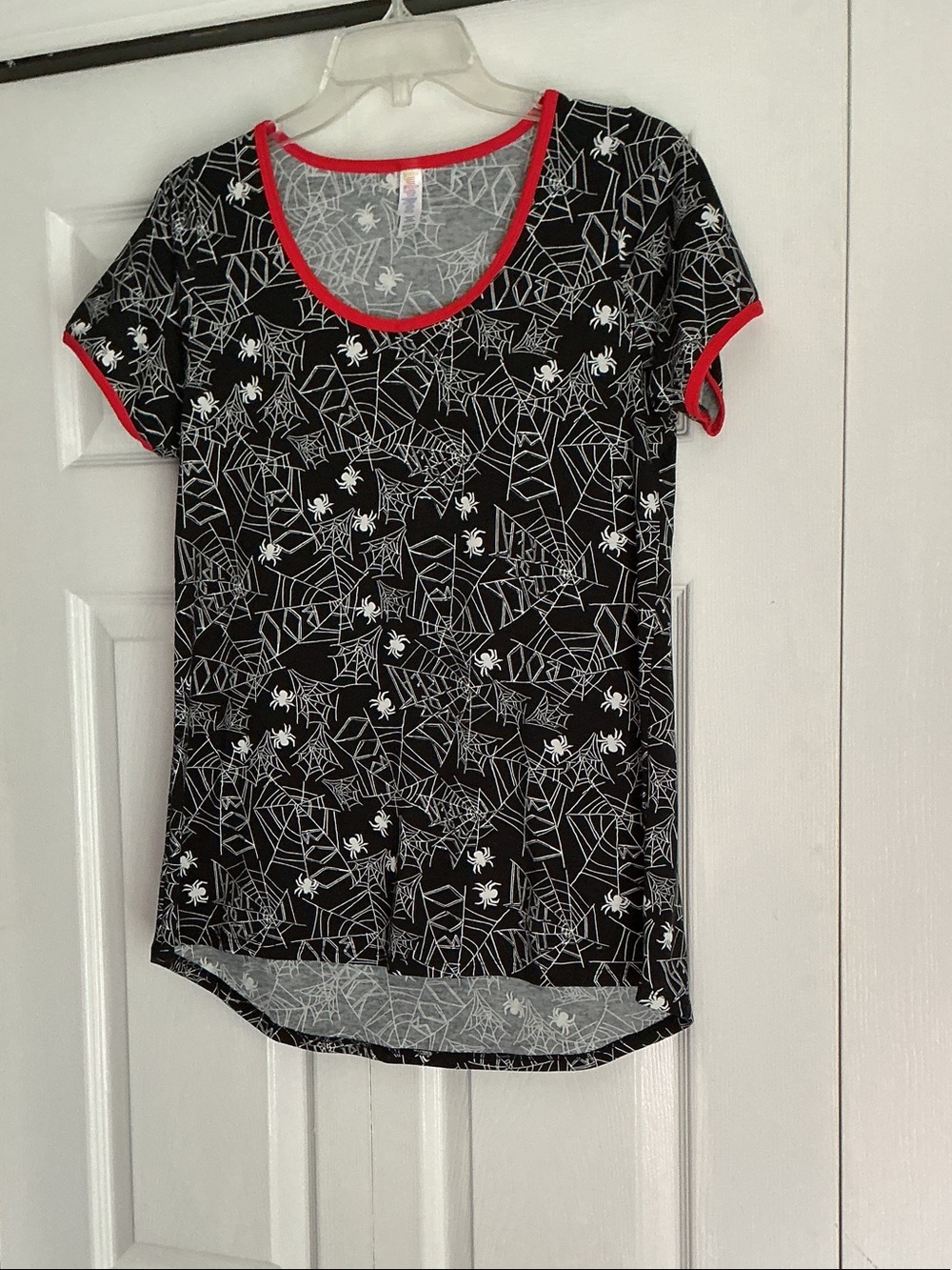 LuLaRoe Black Spiderweb Print Short Sleeve Top with Red Trim